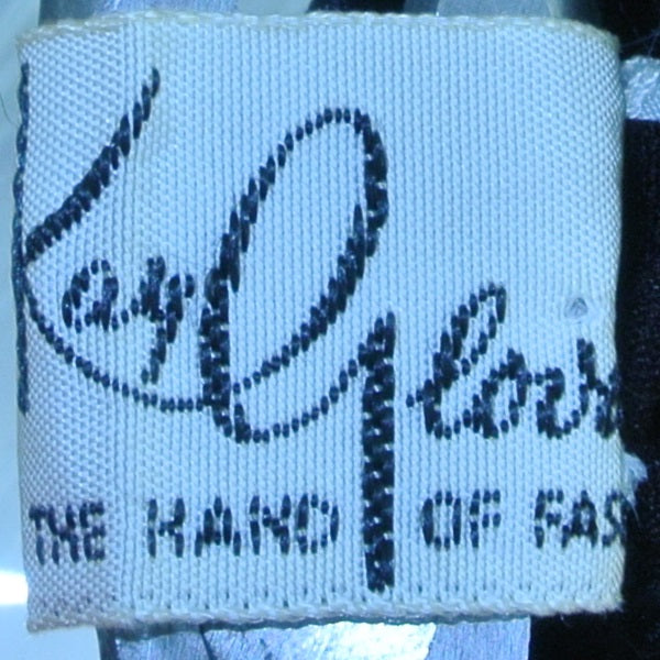 VINTAGE BLACK WRIST LENGTH SATIN V RHINESTONES TRIMMED BUTTON SMALL GLOVES BY KAY- MASS PRODUCED