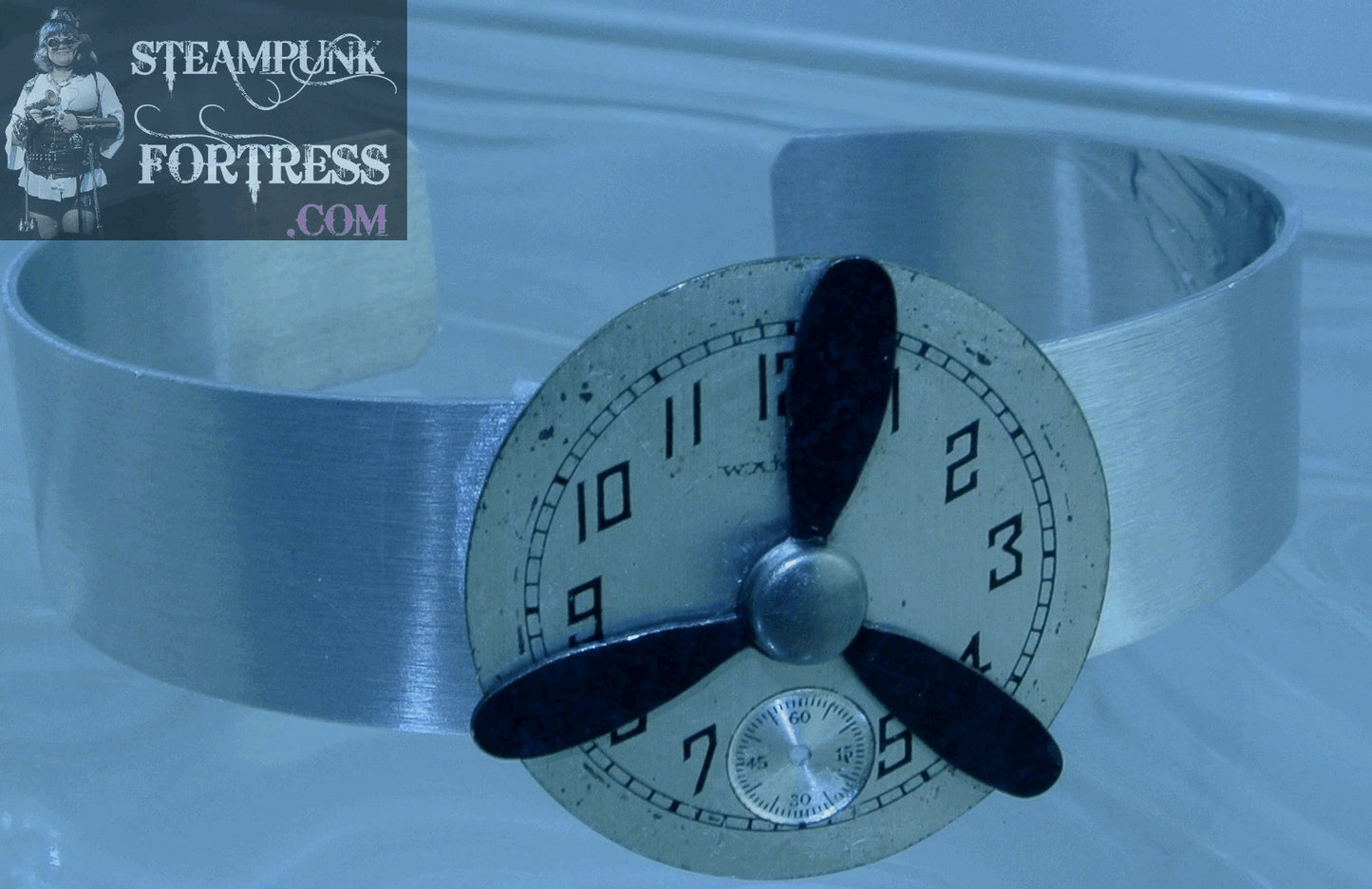 SILVER CUFF WALTHAM WATCH CLOCK FACE SILVER DIAL BLACK PROPELLER KINETIC SPINS SPINNING BRACELET STARR WILDE STEAMPUNK FORTRESS