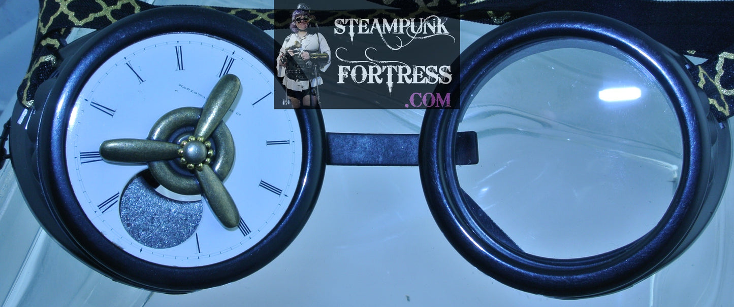 BLACK GOGGLES RIGHT EYE PORCELAIN AUTHENTIC GENUINE WATCH CLOCK DIAL LARGE BRASS KINETIC SPINS SPINNING PROPELLER BLACK GOLD STRETCH RIBBON STARR WILDE STEAMPUNK FORTRESS