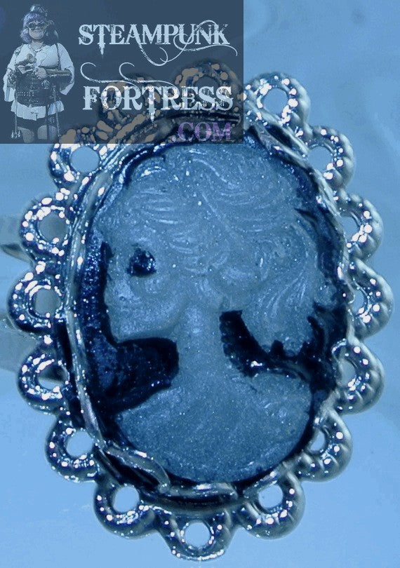 GLOW IN THE DARK SILVER CAMEO LADY SKELETON LOOKING RIGHT ON BLACK LACE EDGE ADJUSTABLE RING STARR WILDE STEAMPUNK FORTRESS VICTORIAN HALLOWEEN