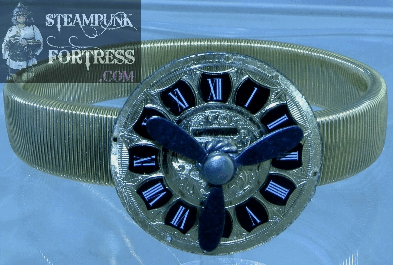 SLEEVE ARM GARTER GOLD LUCERNE WATCH CLOCK FACE GOLD BLACK DIAL BLACK KINETIC SPINS SPINNING PROPELLER STRETCH BRACELET STARR WILDE STEAMPUNK FORTRESS