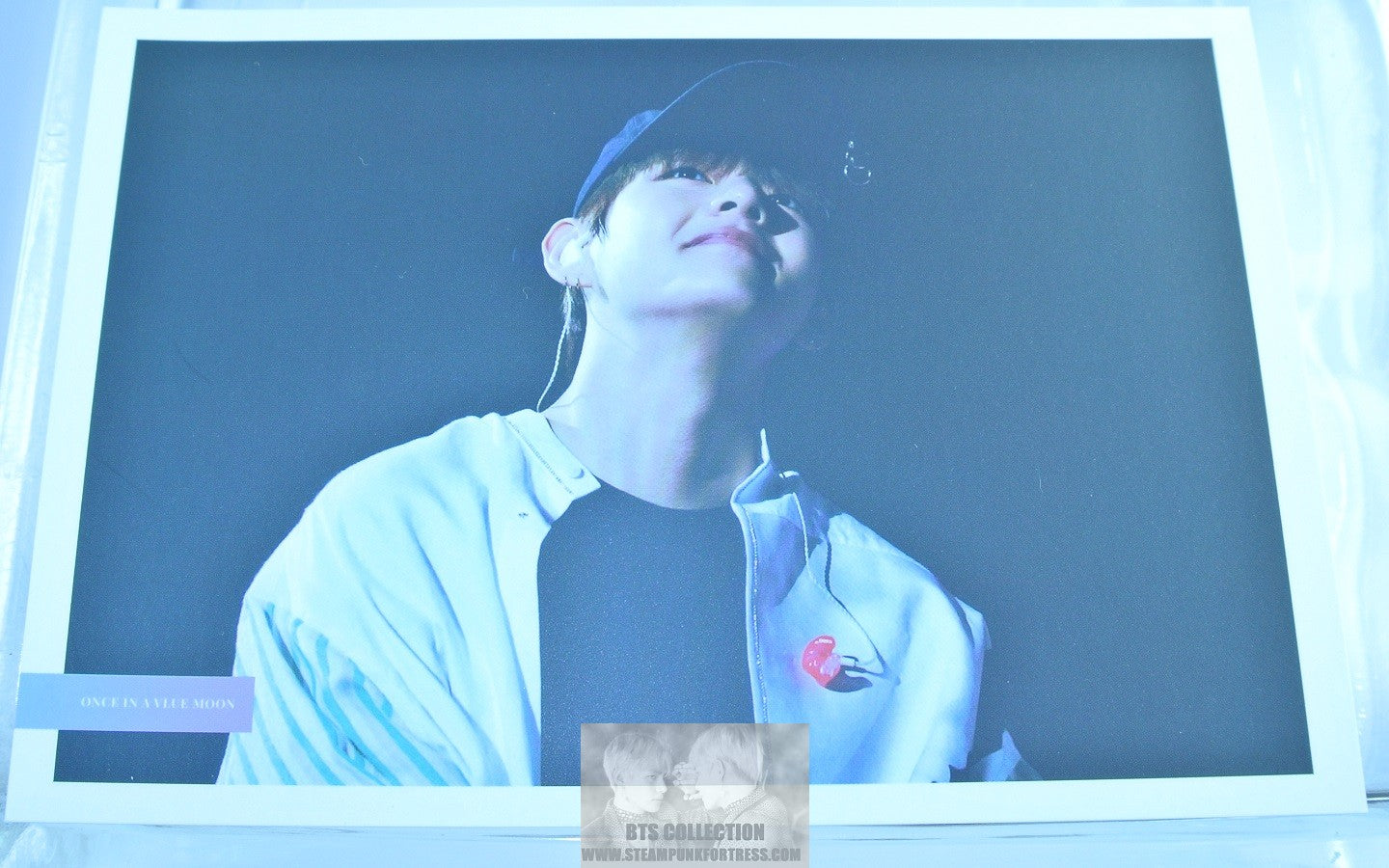 BTS POSTCARD V KIM TAEHYUNG BLACK CAP WHITE GREEN STRIPED SHIRT LOOKING UP VIA FANSITE ONCE IN A VLUE MOON PHOTO