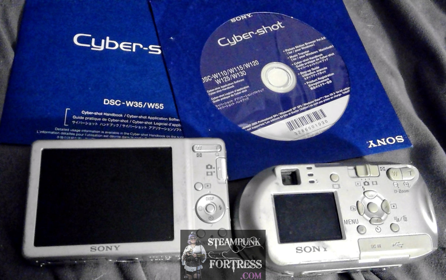 LOT OF 2 SONY CYBERSHOT CAMERAS SILVER BODY NOT WORKING PARTS ONLY CD DSC W35