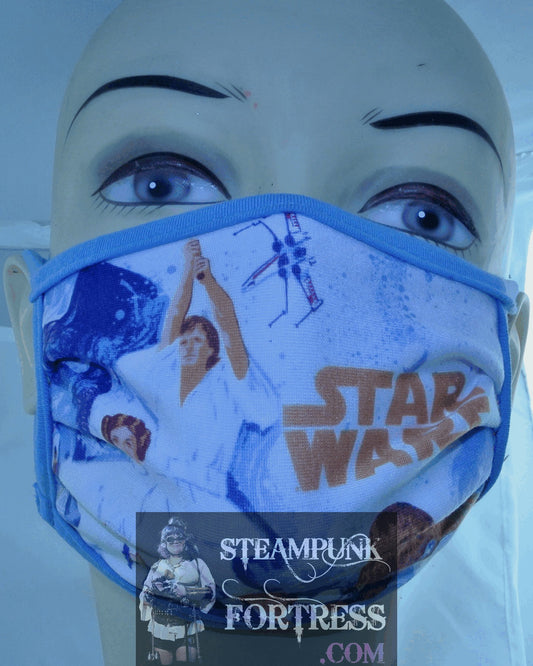 STAR WAS AUTHENTIC SHOP OFFICIAL DISNEY STAR WARS FACE MASK VINTAGE POSTER PRINCESS LEIA HAN SOLO LUKE SKYWALKER CHEWBACCA LIGHT BLUE WASHABLE REUSABLE REUSEABLE CLOTH - MASS PRODUCED