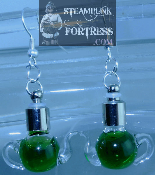 SILVER TEAPOTS TEA POTS GREEN LIQUID VIAL PIERCED EARRINGS ALICE IN WONDERLAND MAD HATTER TEA PARTY DUELLING DUELING RACES STARR WILDE STEAMPUNK FORTRESS