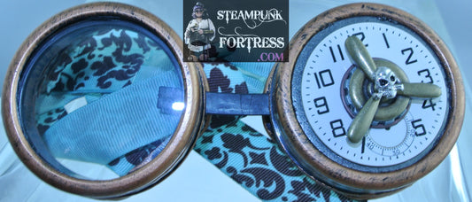 COPPER GOGGLES LEFT EYE PORCELAIN AUTHENTIC GENUINE WATCH CLOCK FACE DIAL BRASS KINETIC SPINS SPINNING PROPELLER SKULL RHINESTONE STUD BLUE BROWN PAISLEY RIBBONS STARR WILDE STEAMPUNK FORTRESS