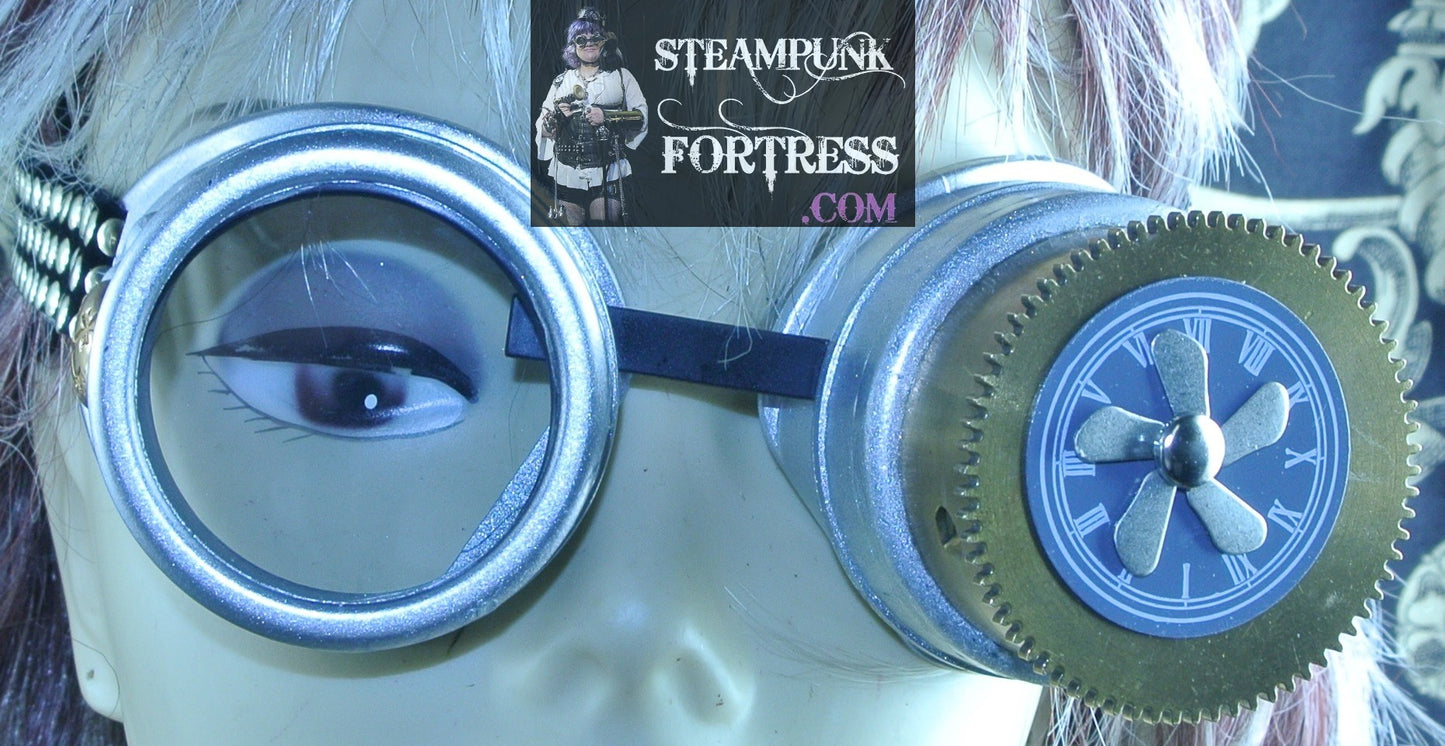 SILVER MATTE GOGGLES LEFT EYE BRASS AUTHENTIC GENUINE BARREL GREY GRAY WATCH CLOCK FACE DIAL 5 ARM KINETIC SPINS SPINNING PROPELLER BRASS SIDES BLACK STUDDED RIBBONS STARR WILDE STEAMPUNK FORTRESS